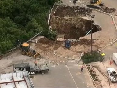 VIDEO: Flash Flood Watches, Sink Holes and Cars Swept Away in Flood Waters