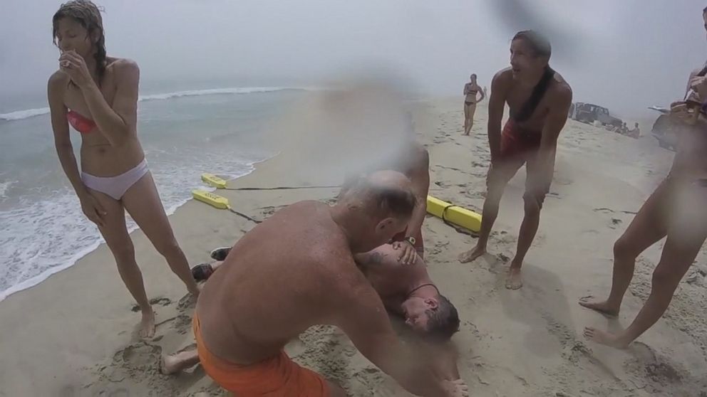 Video Watch Dangerous Riptide Sucking Young Woman and Father Under Water -  ABC News