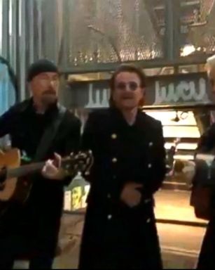 VIDEO: U2 performs a surprise pop-up concert on NYC street corner