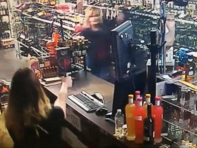 WATCH: Mother and daughter in a violent shootout with an armed robbery