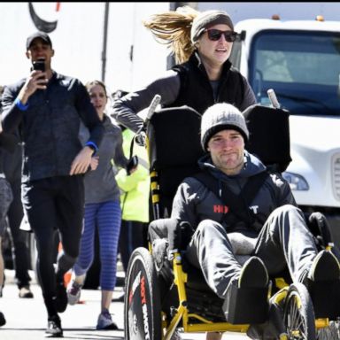 VIDEO: Woman completes Boston Marathon early, pushing boyfriend in wheelchair