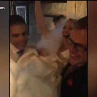 VIDEO: Couple get married in torrential rain