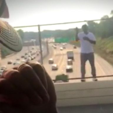 VIDEO: Truck driver offers a drink and talks a man off the ledge