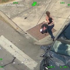 Driver pulls baby out of the back seat after crashing in a high-speed police chase