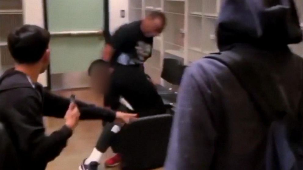 Teacher and blue-haired student brawl in classroom - wide 3