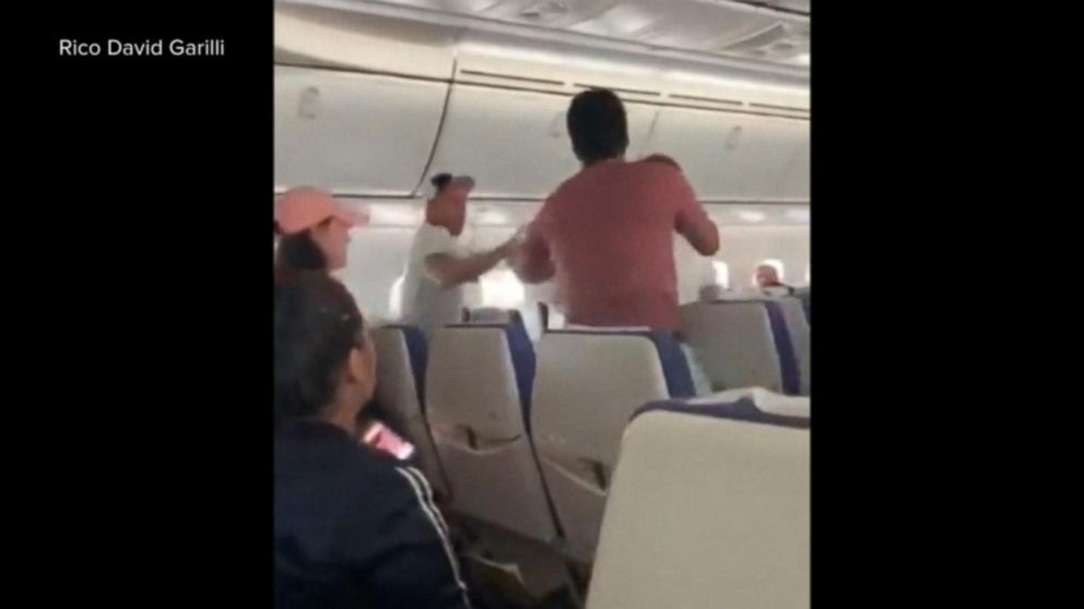 Passengers Brawl Midair During A Flight To Singapore Video Abc News