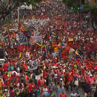 VIDEO: Thousands took to the streets in Venezuela as the interim president held a rally 