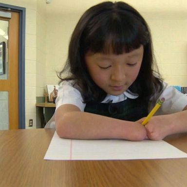 VIDEO: 10-year-old girl born with no hands wins national handwriting competition