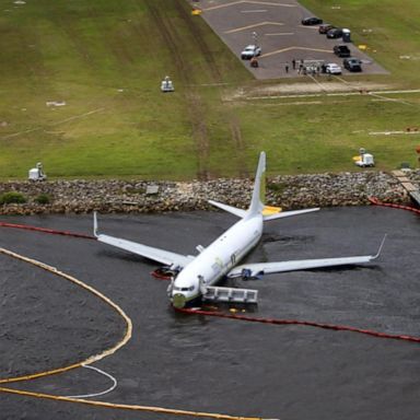 VIDEO: 143 people rescued from plane that slid into a nearby river