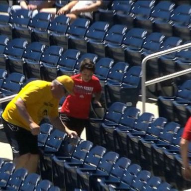 VIDEO: Man draws boos at Big 10 semifinal after taking foul ball from young fan 