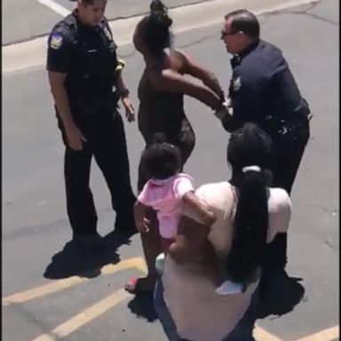 VIDEO: Tense confrontation between Phoenix police and a young family