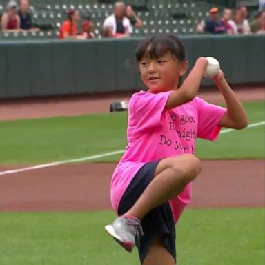 VIDEO: 10-year-old girl who was born without hands threw the first pitch at a baseball game