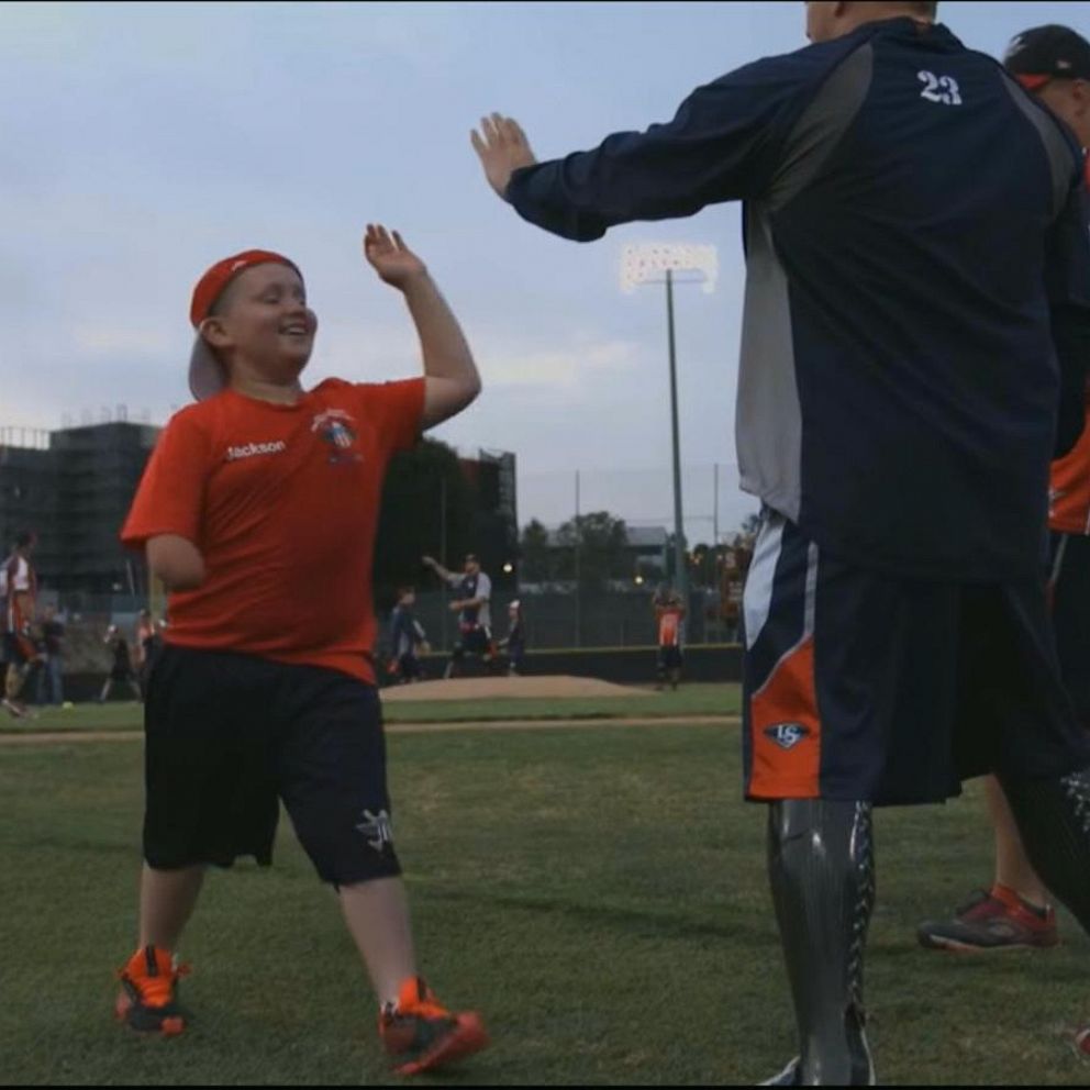 Camp helps wounded veterans, children with disabilities bond over softball  - ABC News