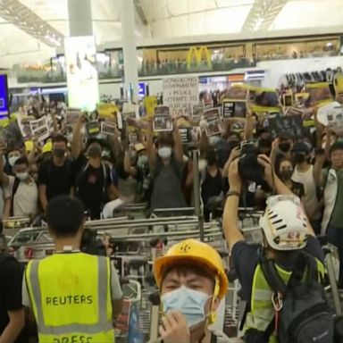 VIDEO: Pro-democracy protests turn violent as Hong Kong airport cancels flights again