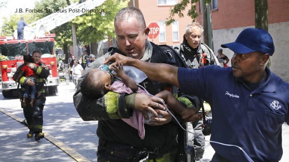 Firefighters responding to St. Louis apartment fire save 4 children left  alone inside