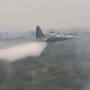 VIDEO: Brazil’s air force deployed tankers to drop water on the Amazon as it burns