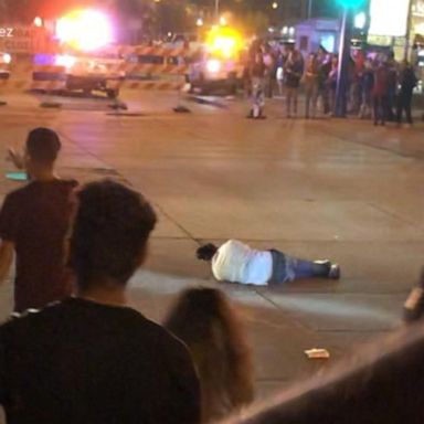 VIDEO: Police looking for driver who plowed into crowd, hitting 2 people