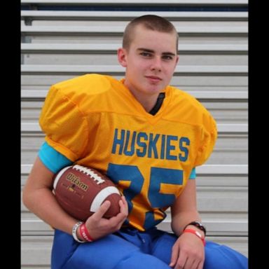 VIDEO: Teen with brain cancer takes field as high school football player