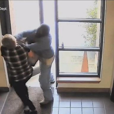 VIDEO: Bank employee, 60, seen fighting off armed robber in Texas