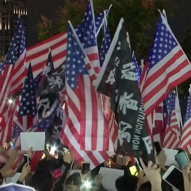 VIDEO: Thousands of protestors wave American flags in Hong Kong