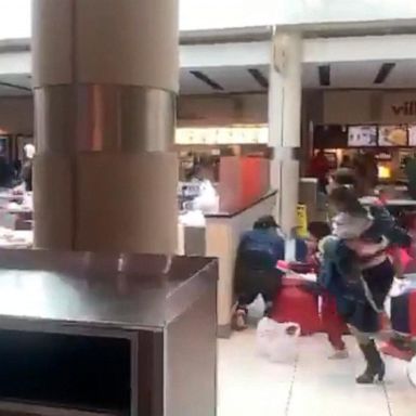 VIDEO: Video shows holiday shoppers running for safety in a mall after hearing gunshots 