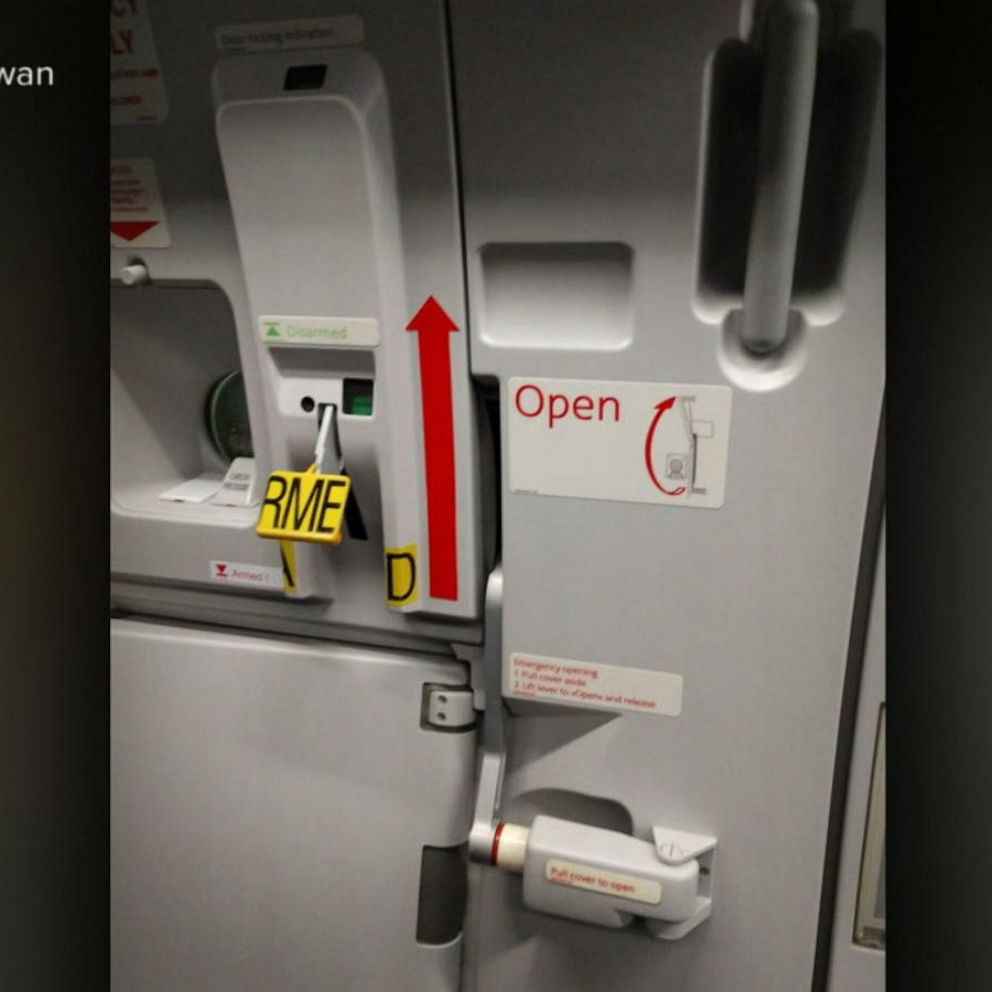 Flight diverted after 'unruly passenger' attempts to open exit door mid- flight: Witnesses - ABC News
