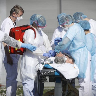 VIDEO: New images in Spain show patients on hospital floors