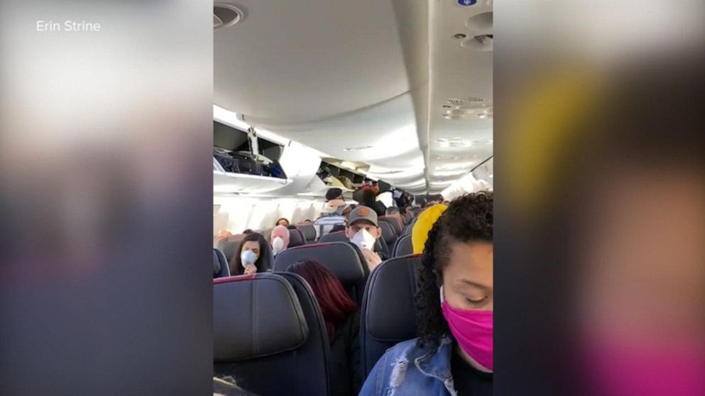 Video Images from a crowded American Airlines flight - ABC News