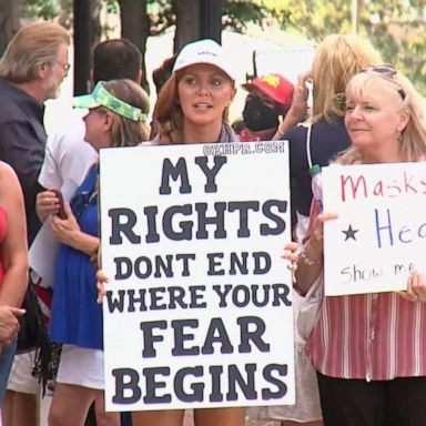 VIDEO: Debate over facial coverings intensifies