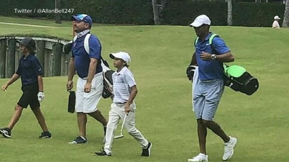 Tiger Woods Caddies For His 11-Year-Old Son At Junior Golf Tournament