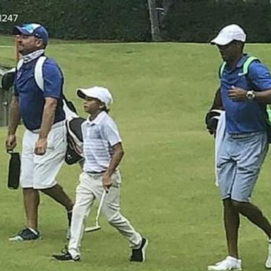 VIDEO: Tiger Woods caddies for son Charlie at US Kids Golf event