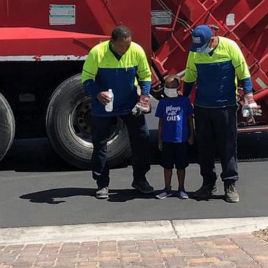 VIDEO: Child surprises sanitation workers during coronavirus pandemic