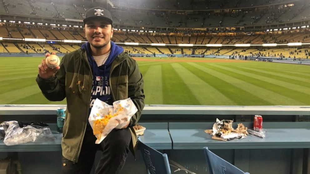 Video LA Dodgers player hits home run, surprises fan with nachos - ABC News