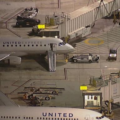 VIDEO: Man opens plane door, jumps onto taxiway