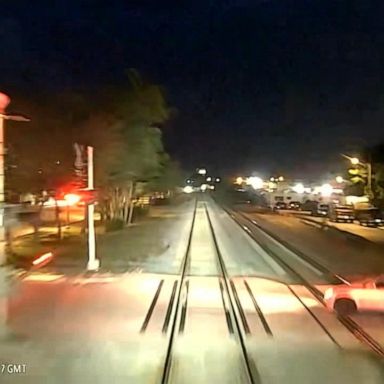 VIDEO: Train rips car in half