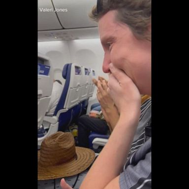 VIDEO: Airline passengers cheer on cancer survivor 