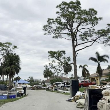 VIDEO: Photographer works to help families restore hurricane-ravaged photos