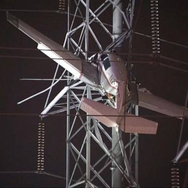 VIDEO: Pair rescued from plane after crash into power lines