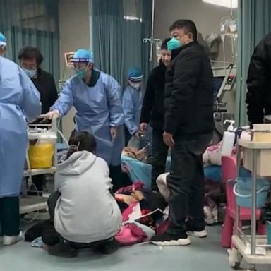 VIDEO: COVID cases surge across China, overwhelming hospitals