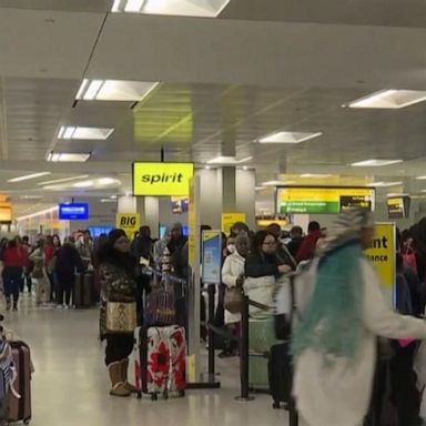 VIDEO: Tens of thousands delayed and stranded on Christmas Eve