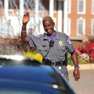 VIDEO: College grads pay tribute to beloved security guard