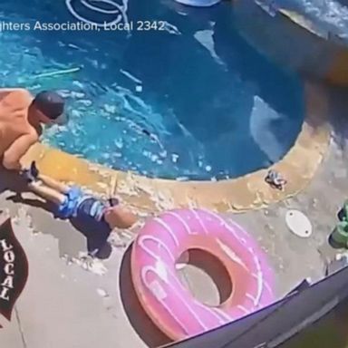 VIDEO: Dramatic video shows firefighter dad rescue infant son from drowning