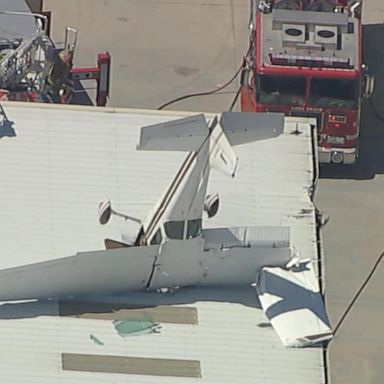 VIDEO: Small plane crashes into roof of building: Officials