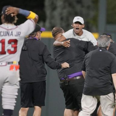 VIDEO: Atlanta Braves outfield tackled by fans who ran on field