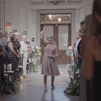 VIDEO: Bride's grandma steals the show as flower girl at wedding