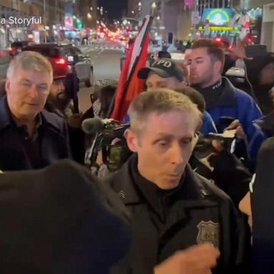 VIDEO: Alec Baldwin escorted away from protest by police