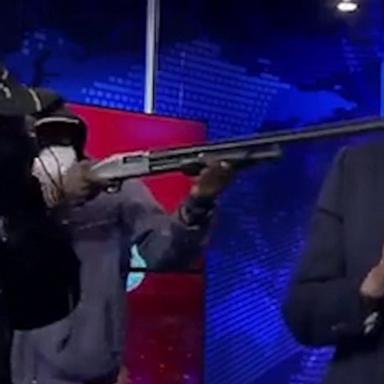 VIDEO: Armed men take over TV station in Ecuador