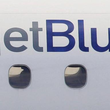 VIDEO: Unruly passenger restrained on JetBlue flight