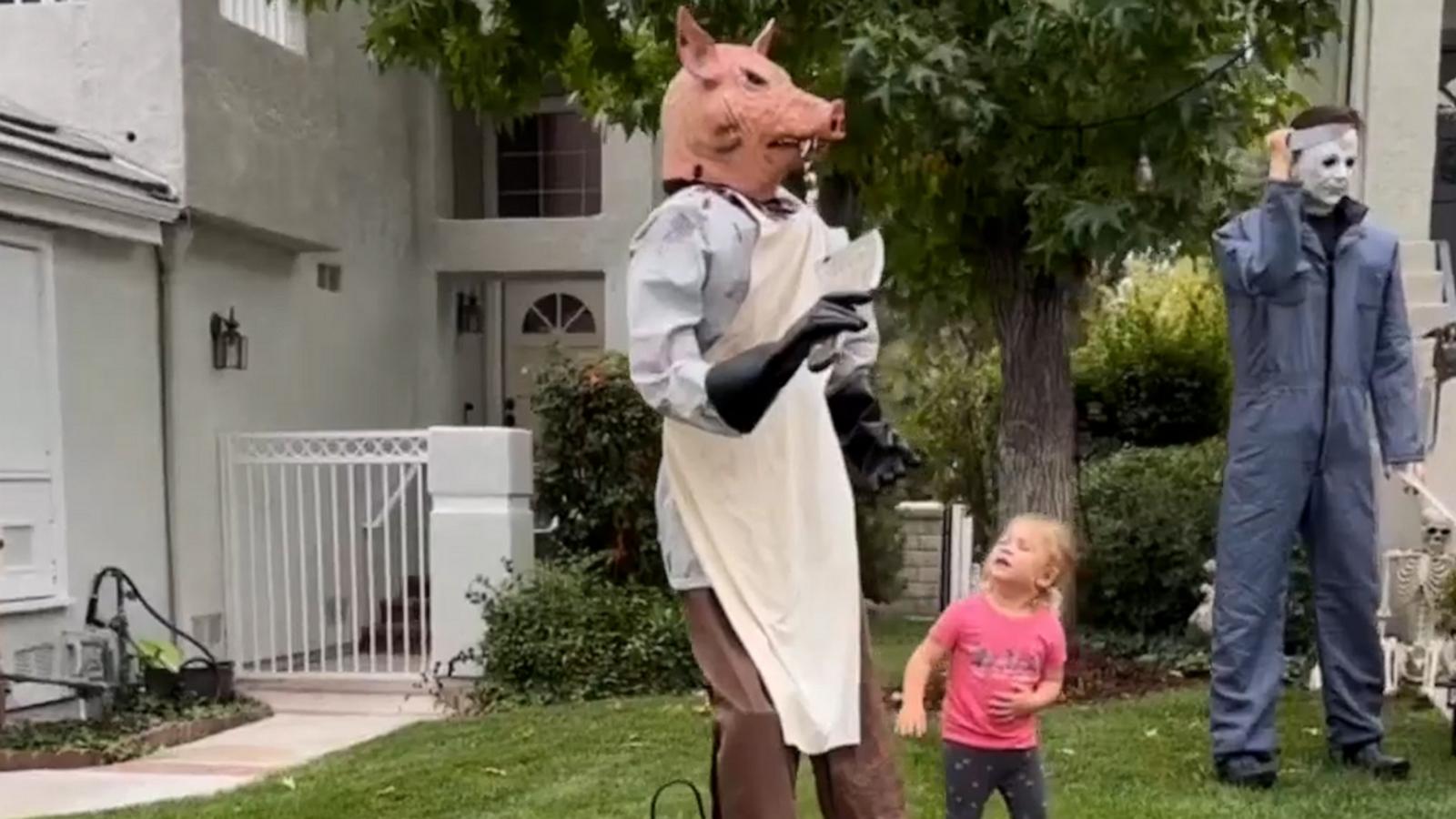 This toddler is in awe of a scary Halloween decoration that she thinks is Peppa Pig