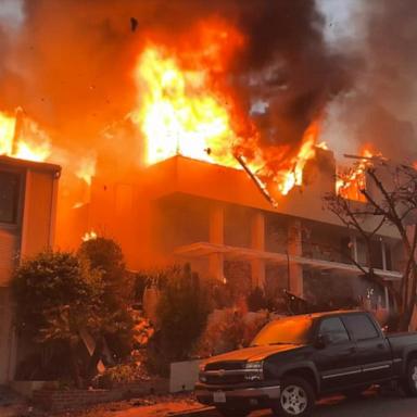 VIDEO: Homes still bursting into flames in LA days after the initial fire passed through